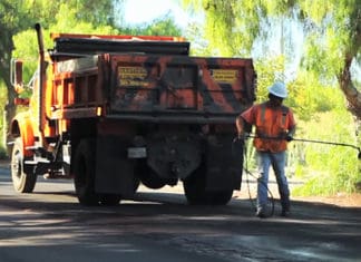 County Board Approves Road Work, Receives Road Improvement Report