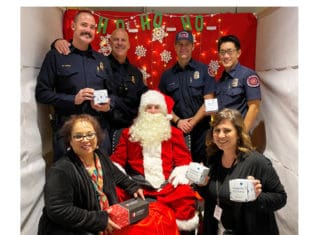 Santa Visits San Marcos City Hall to Deliver Shoes to 58 elementary school students and homeless teens