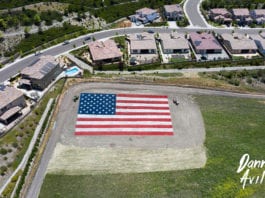 Antique Gas and Steam Engine Museum Displays 11,000 Sq. Ft. Flag for Memorial Day VIDEO