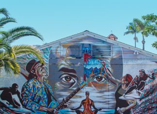 Carlsbad Artist Taylor Gallegos Paints the Carlsbad Art Wall