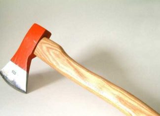 Woman Attacks Police Officer With Axe