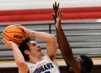 Pair of 20-Point Performances Lead Cougars Past Warriors, 75-69